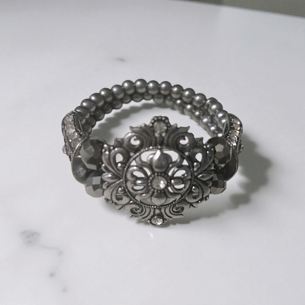 Unique handmade stretchy bracelet.  It will get compliments!